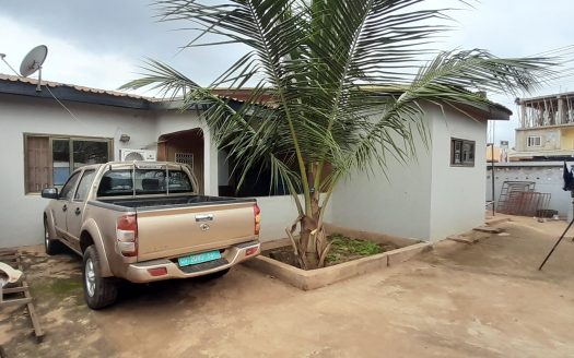 Commercial property with attached 4 bedroom house for sale.