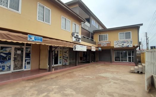 Commercial property with attached 4 bedroom house for sale.
