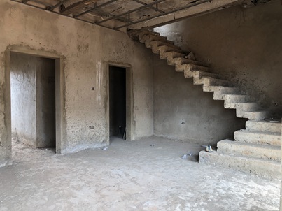 uncompleted 3 bedrooms with out-houses for sale.