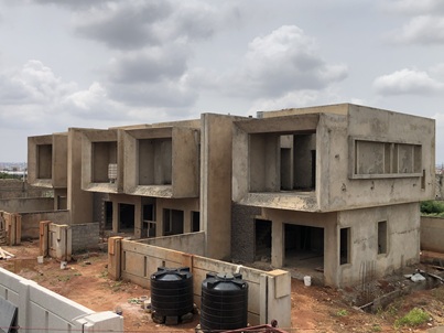 uncompleted 3 bedrooms with out-houses for sale.