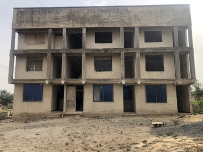 uncompleted apartment block for sale.
