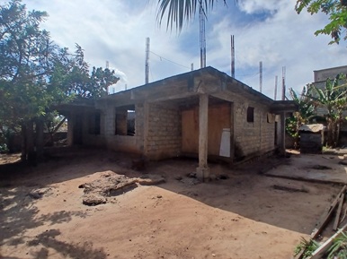 uncompleted storey for sale at Adenta Pantang.
