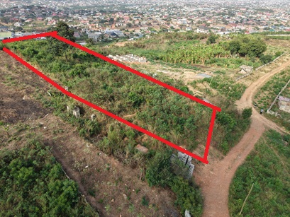 An acre(4 plots) on the hill top with nice aerial view.