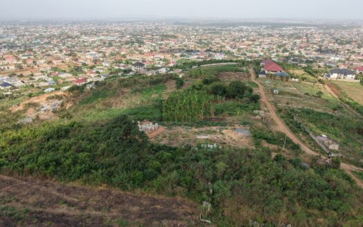 An acre(4 plots) on the hill top with nice aerial view.