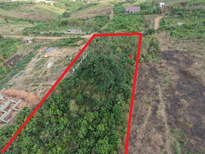 An acre(4 plots) on the hill top with nice aerial view.